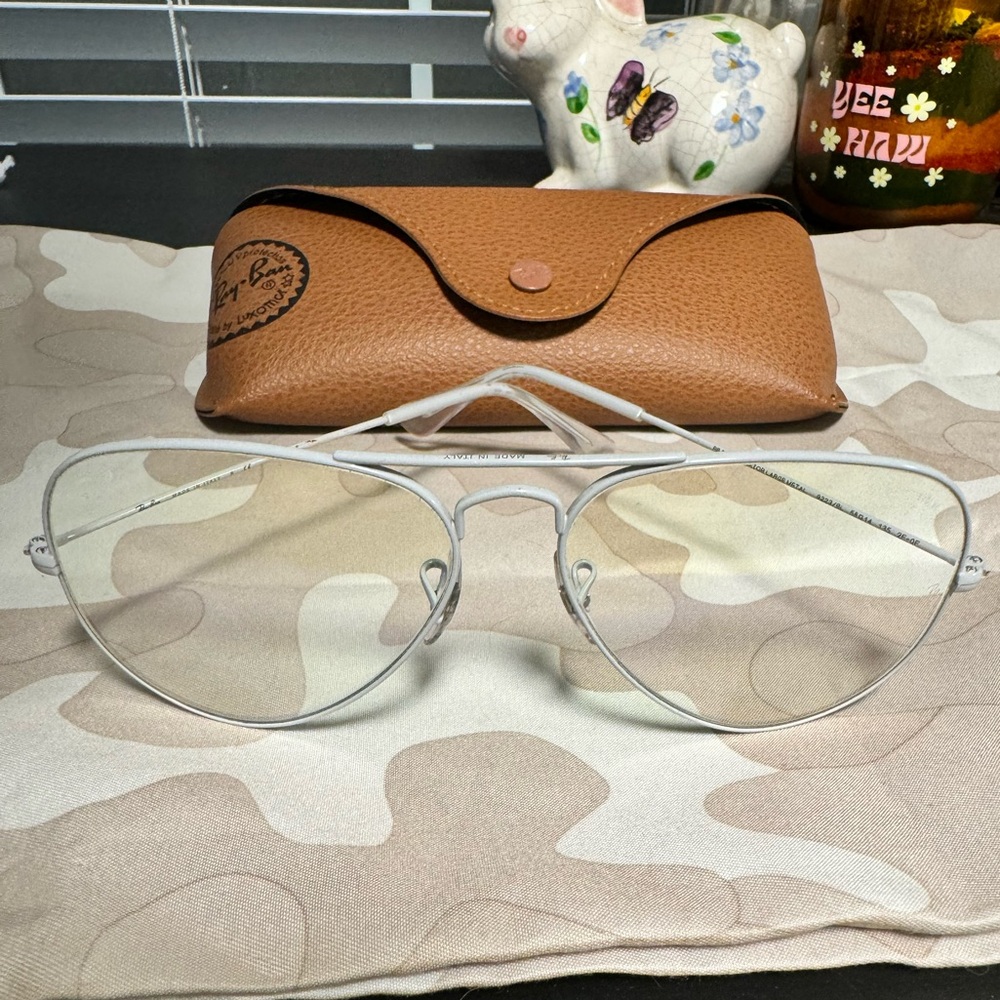 Ray-Ban white framed aviators.